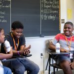 Students talk during an education session