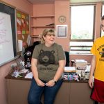 Professor Crystal Howell and Caleb Schmitzer go over their notes about the project