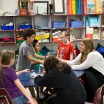 Randolph teaching alumna Kate Thornhill works with students in her elementary school classroom