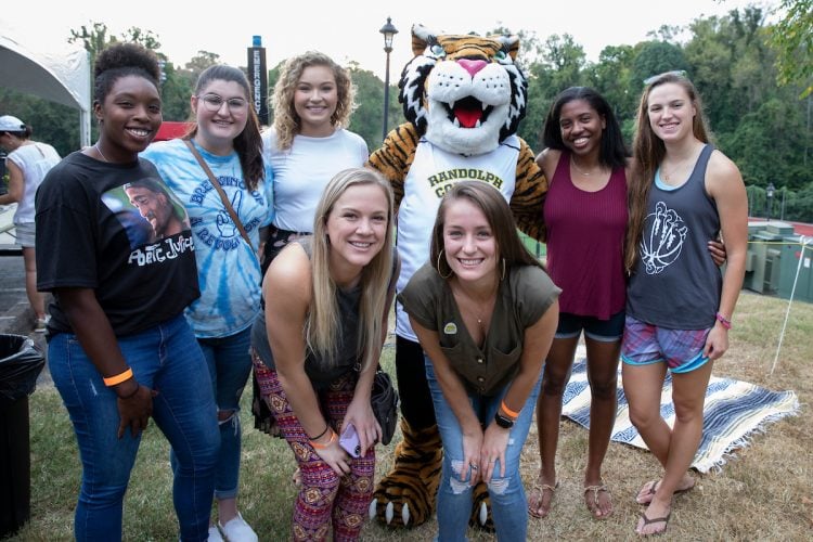 Alumnae pose with Wanda WildCat during the tailgate event Alumnae pose with Wanda WildCat during the tailgate event