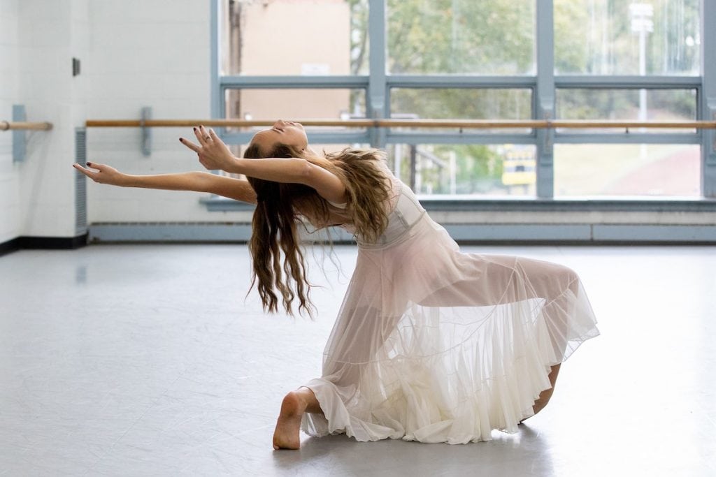 Emma Carrico practices a solo routine in the dance studio for the upcoming concert