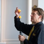 Physics professor Peter Sheldon gives a demonstration for the Physics Phun event during WildCat Weekend