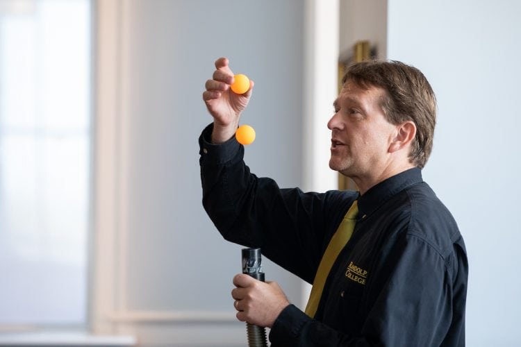 Physics professor Peter Sheldon gives a demonstration for the Physics Phun event during WildCat Weekend Physics professor Peter Sheldon gives a demonstration for the Physics Phun event during WildCat Weekend