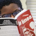 A student reads during the program