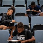 Students participate in a group reading exercise