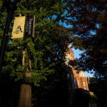 Randolph College banner in front of Main Hall