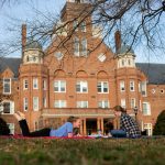 Students study in front of Main Hall