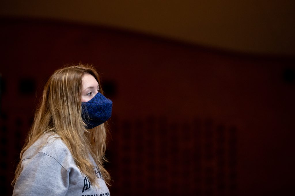 Kayla Morris' 22 uses a specially designed mask to sing during a class.