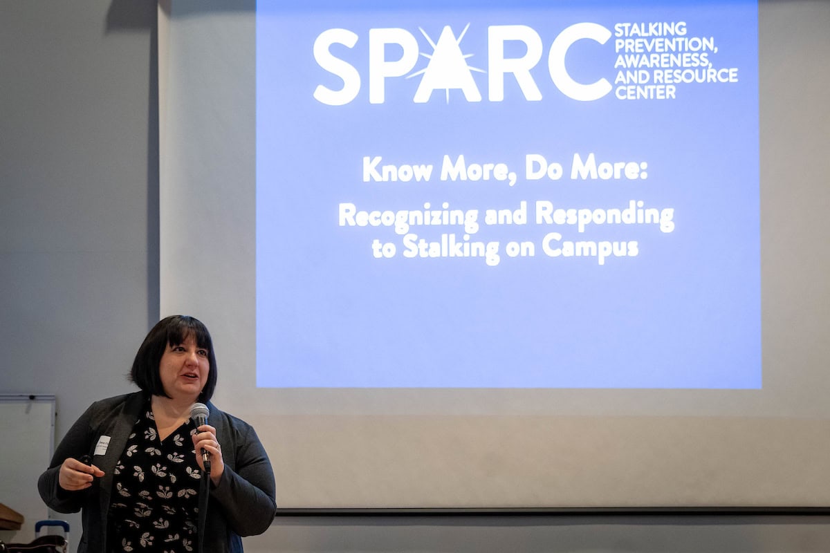 Dana Fleitman, associate advisor for the Stalking Prevention, Awareness and Resource Center, speaks to Randolph faculty and staff during the on-campus training session.