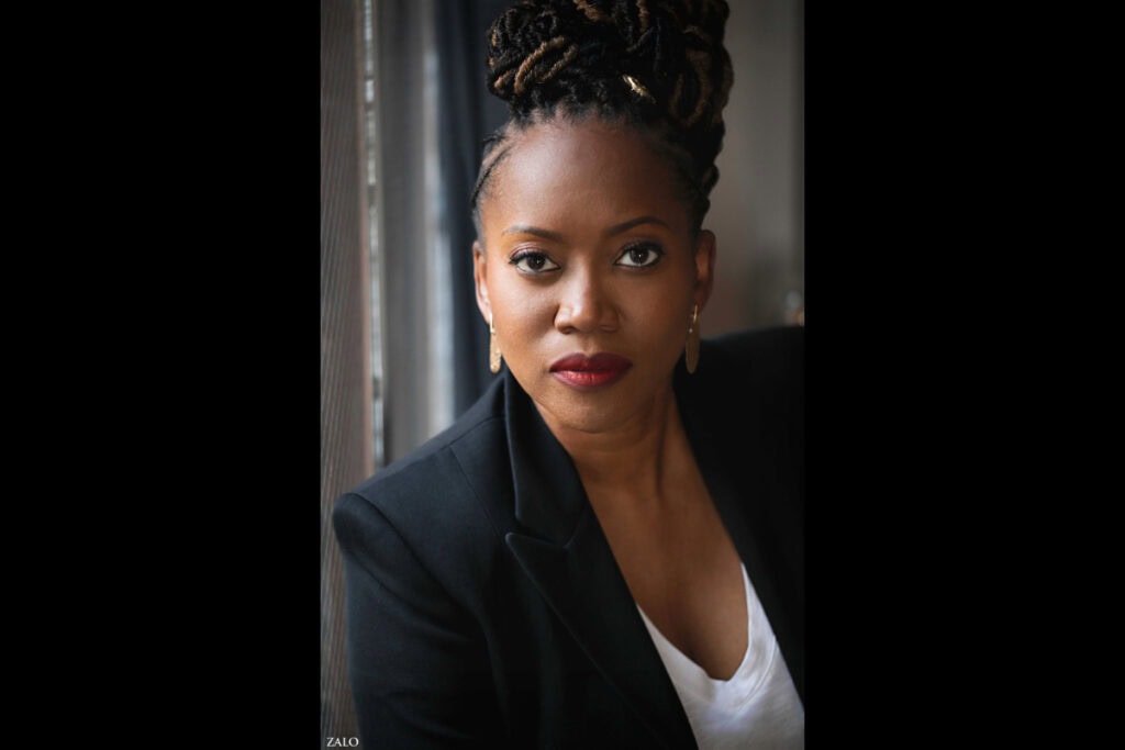 A portrait photo of actress Erika Alexander