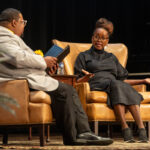 Actress and activist Erika Alexander sits onstage, talking to Chief Diversity Officer Charles Gibson III during Randolph College's annual MLK Celebration.