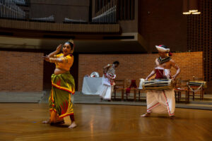 Chinthaka Bandara and Vajira Mantillake perform Kandyan dance in Houston Memorial Chapel during a special event.