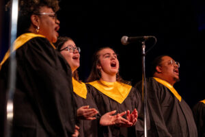 Randolph College's gospel choir performs on stage