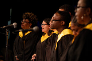 Randolph College's gospel choir performs on stage