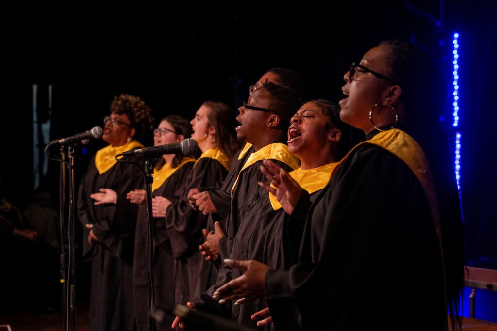 Randolph College's gospel choir performs on stage Randolph College's gospel choir performs on stage