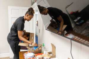 Nafi Thiam organizes treats for a special Intercultural Center event.