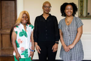 Kamaria Janaye Clark, Jordyn Grace Shumpert, and Quianday Unique Worthington pose together after being inducted into Phi Beta Kappa. 
