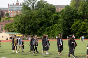 Student walk in the processional during Commencement 