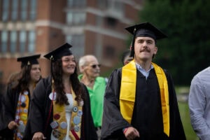 Students walk in the processional during Commencement 