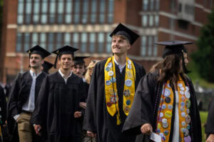 Students walk in the processional during Commencement 