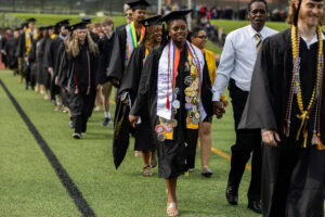 Students walk in the processional during Commencement 