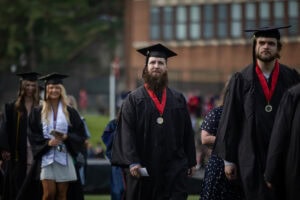 Students walk in the processional during Commencement 
