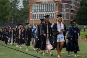 Student walk in the processional during Commencement 