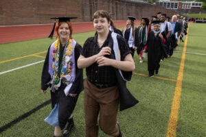 Student walk in the processional during Commencement 