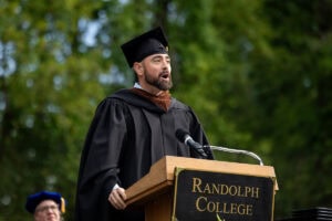 2025 Commencement speaker Geoffrey Kershner gives his speech at the podium 