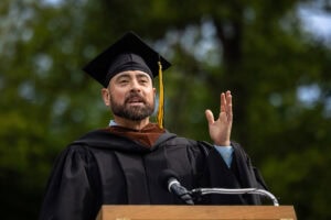 2025 Commencement speaker Geoffrey Kershner gives his speech at the podium 