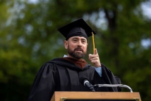 2025 Commencement speaker Geoffrey Kershner gives his speech at the podium 