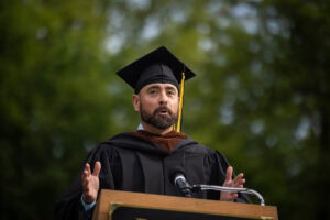 2025 Commencement speaker Geoffrey Kershner gives his speech at the podium 
