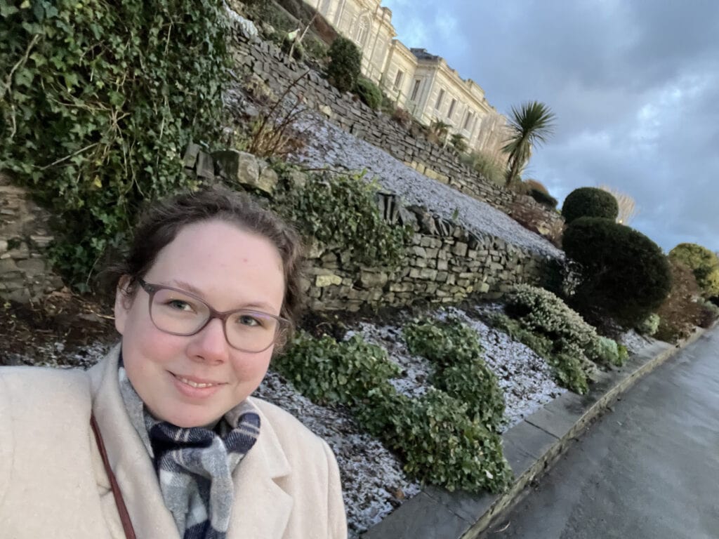 Elizabeth Bailey poses for selfie in front of the National Library of Wales while conducting research there Elizabeth Bailey poses for selfie in front of the National Library of Wales while conducting research there