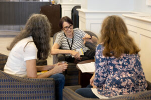 A group of alums talk during a Reunion event
