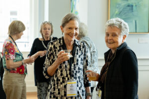 A group of alums talk during a Reunion event