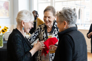 A group of alums talk during a Reunion event
