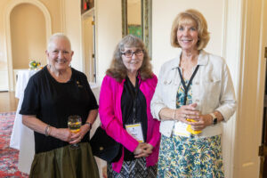 A group of alums pose for a photo together during Reunion