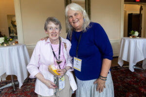 Two alums pose together during Reunion