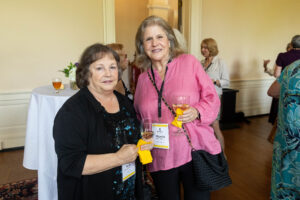 Two alums pose together during Reunion