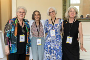 A group of alums pose for a photo together during Reunion