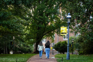 Two alums walks on front campus during Reunion