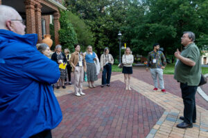 Professor Gerry Sherayko leads a walking tour on campus during Reunion