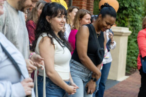 A group of alums walks on front campus during Reunion