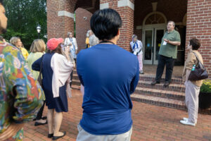 Professor Gerry Sherayko leads a walking tour on campus during Reunion