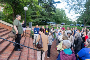 Professor Gerry Sherayko leads a walking tour on campus during Reunion