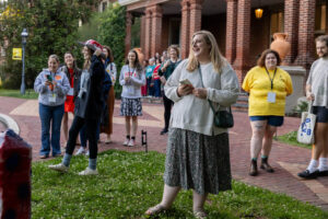 A group of alums gather on front campus during Reunion