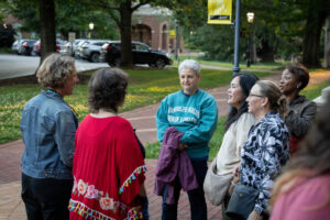 A group of alums gather on front campus during Reunion
