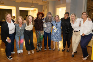 A group of alums pose for a photo together during Reunion