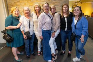 A group of alums pose for a photo together during Reunion