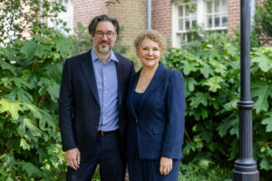 Stacy Robbins Kennedy poses with her husband after receiving the Alum Achievement Award 